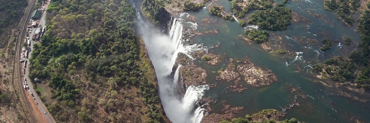 The main curtain of Victoria Falls seen from the Zimbabwean rainforest footpath