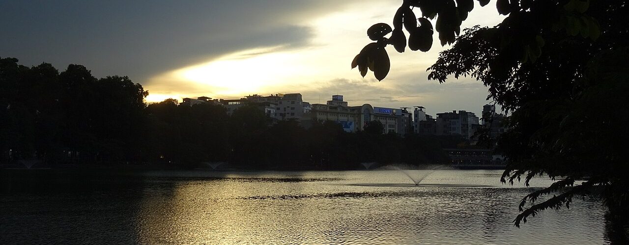 Hoan Kiem Lake surrounded by trees in the Old Quarter of Hanoi, Vietnam