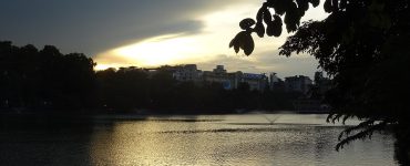 Hoan Kiem Lake surrounded by trees in the Old Quarter of Hanoi, Vietnam