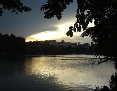 Hoan Kiem Lake surrounded by trees in the Old Quarter of Hanoi, Vietnam